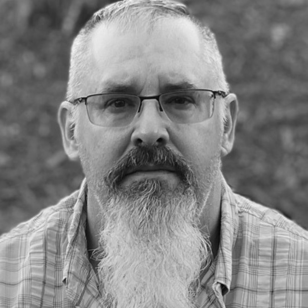 Jason Keddy middle aged man with beard and glasses