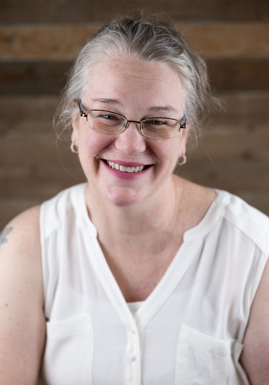 Middle-aged woman with glasses